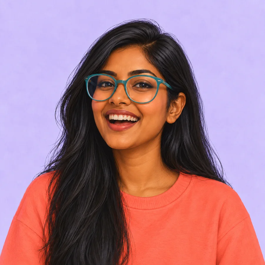 The same long-haired woman laughing broadly behind turquoise glasses