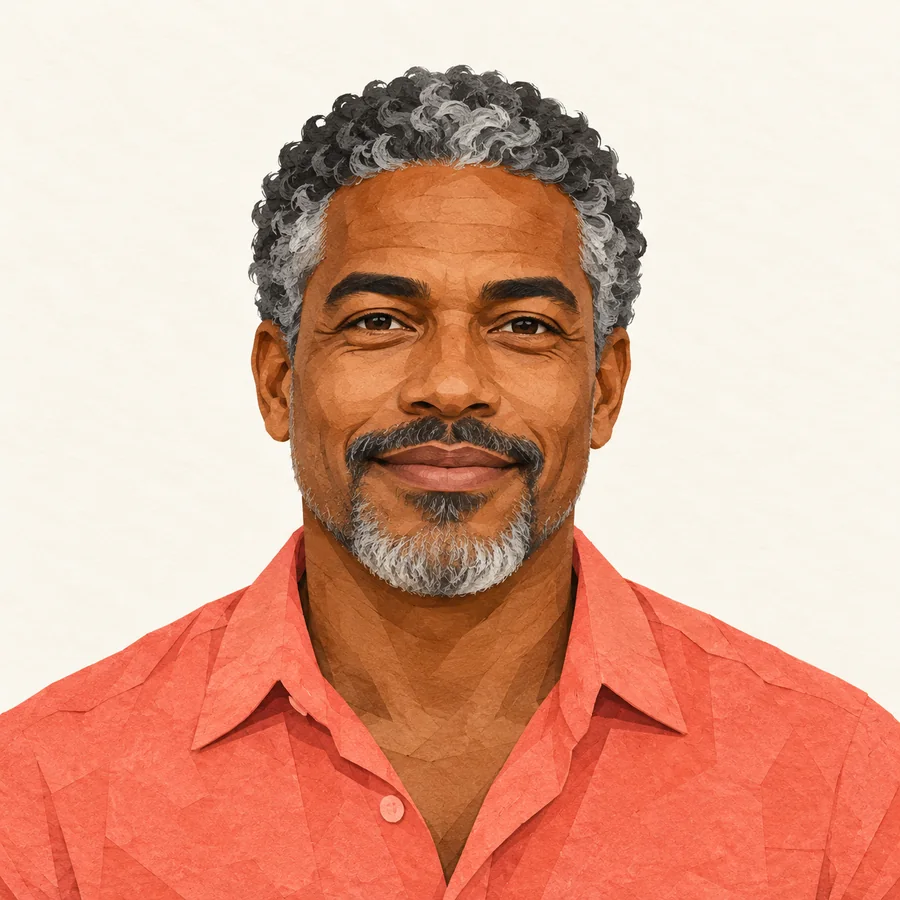 Illustrated adult Black man with short grey curls, a salt-and-pepper goatee and a coral collared shirt